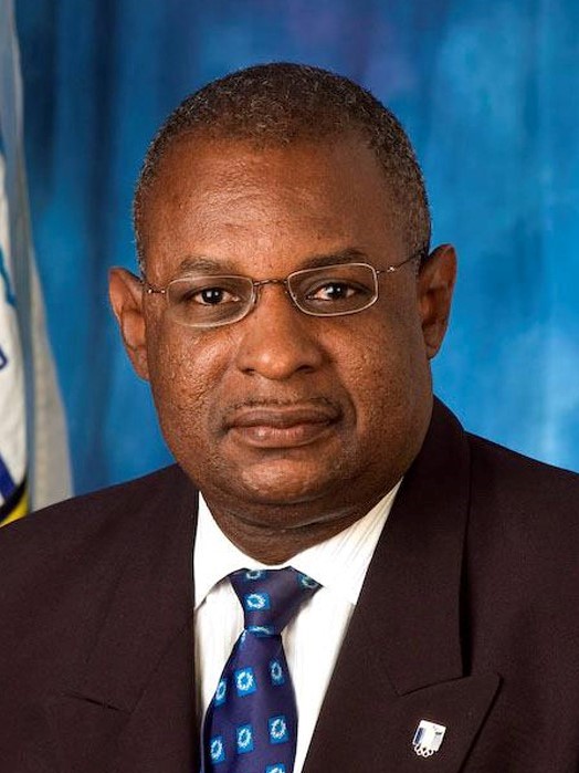 Mr. Erskine St. Clair SIMMONS